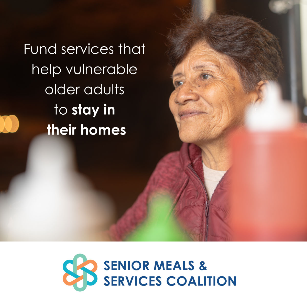 Older woman in a dining setting. Fund services that help vulnerable older adults to stay in their homes. Social media image.
